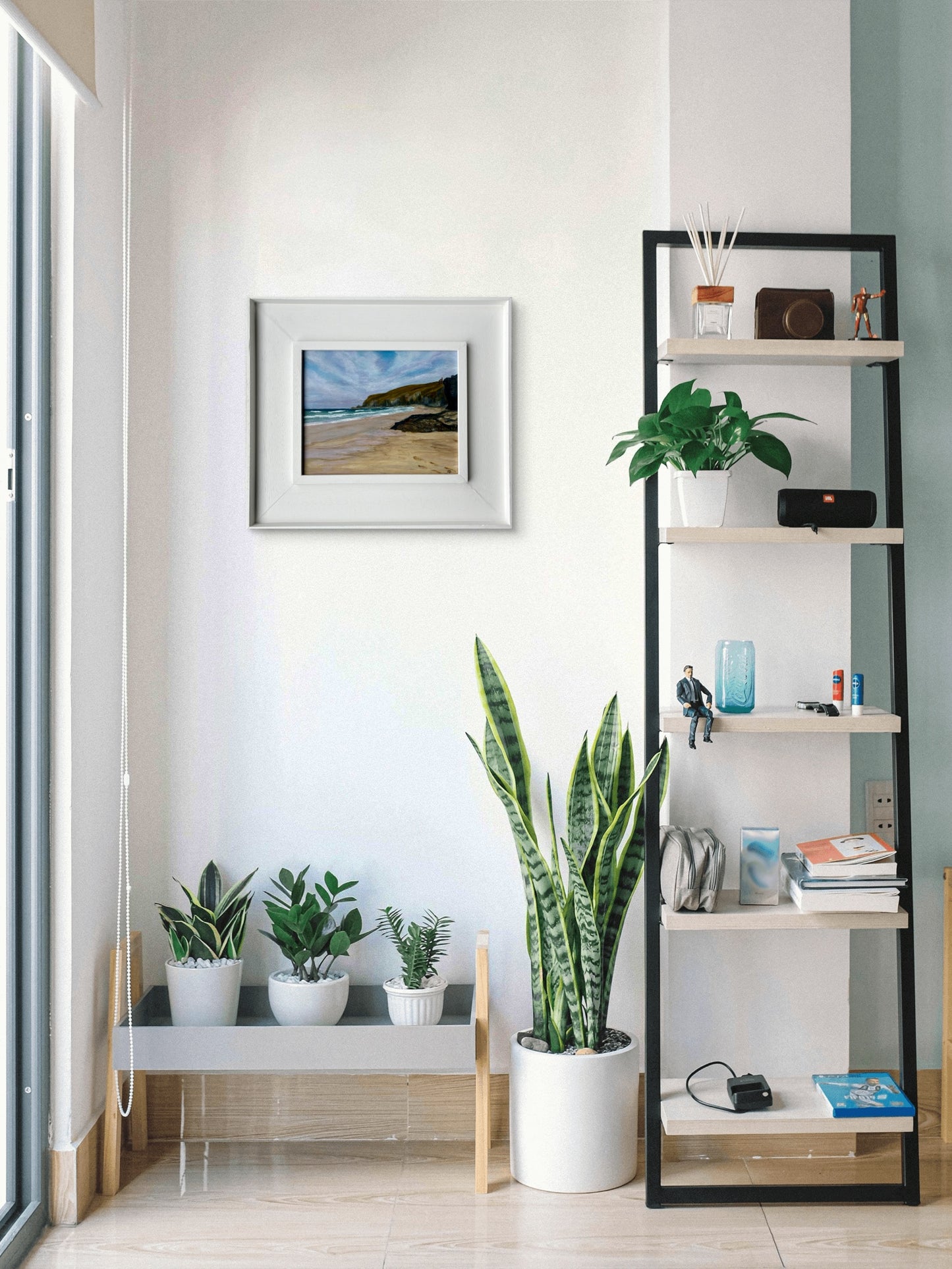Modern Interior with a framed picture of a Cornish beach